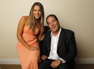 Music recording artist Colbie Caillat poses with her father, record producer Ken Caillat, in Beverly Hills